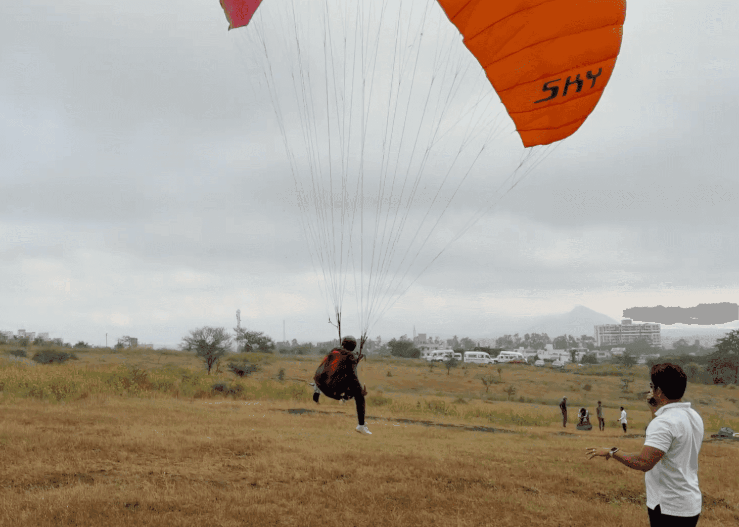 Paragliding training session in progress