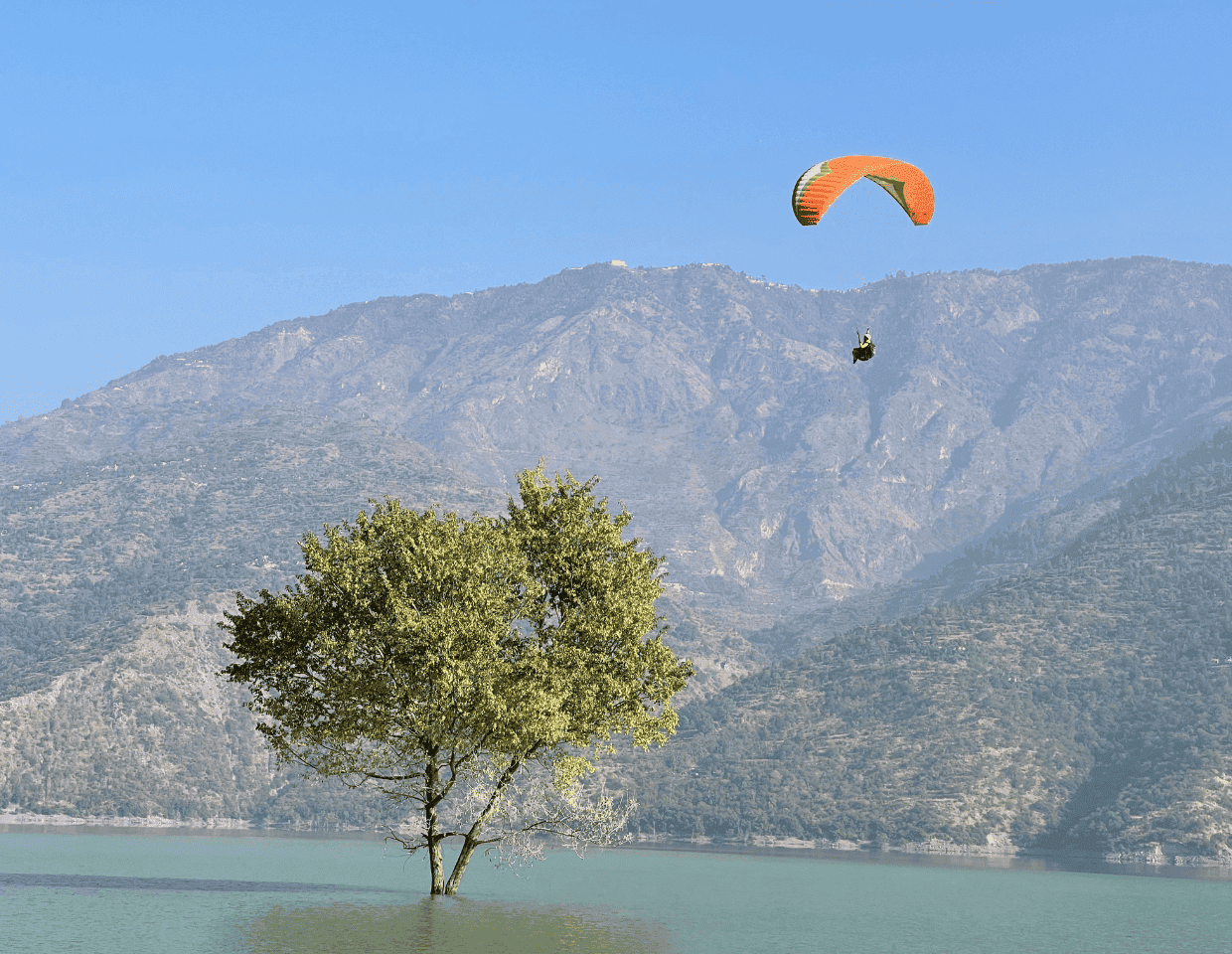 Paraglider above the Sikkim hills near Gangtok